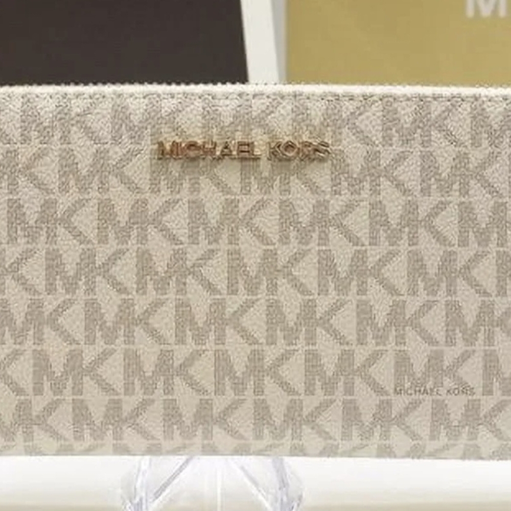 Michael Kors Cream Monogram Clutch